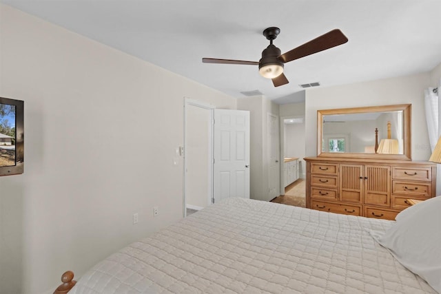 bedroom featuring visible vents and a ceiling fan