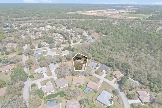 birds eye view of property with a residential view