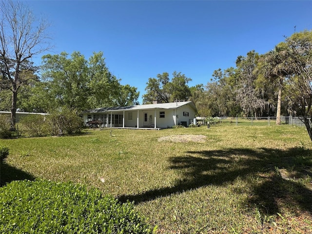 view of yard featuring fence