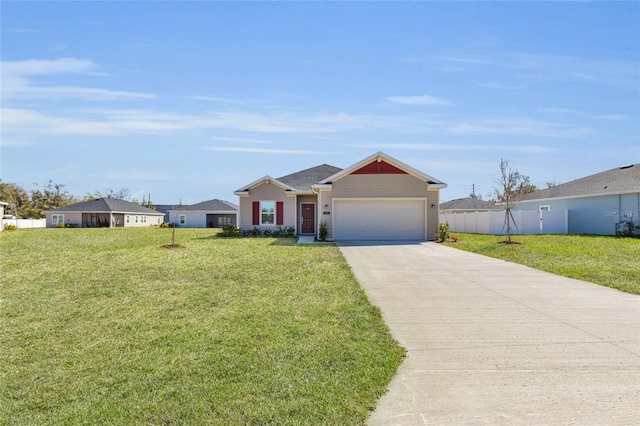 view of front of property with concrete driveway, a front lawn, and fence