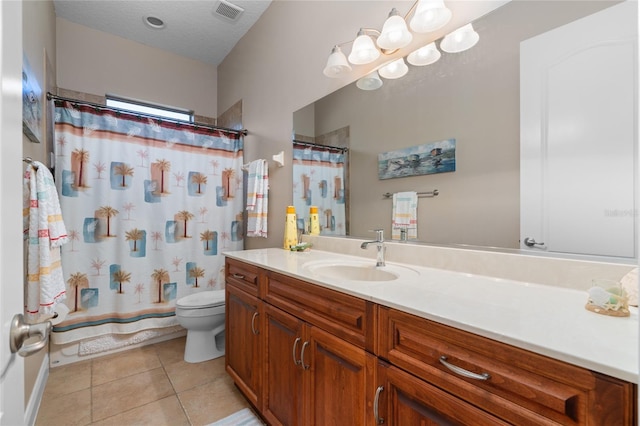 full bath with vanity, visible vents, a textured ceiling, tile patterned floors, and toilet