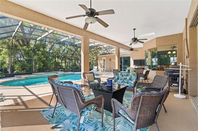 view of patio / terrace featuring a ceiling fan, an outdoor living space, area for grilling, a pool with connected hot tub, and a lanai