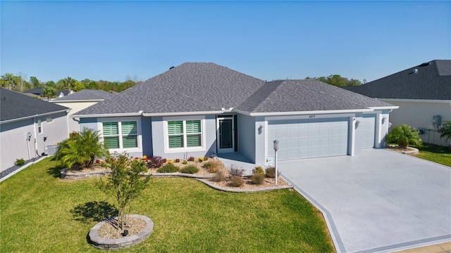 ranch-style home with a shingled roof, a front lawn, stucco siding, a garage, and driveway