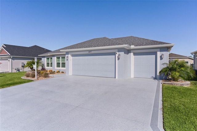 single story home with a front yard, a garage, driveway, and stucco siding