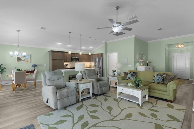 living area featuring crown molding, visible vents, and light wood finished floors