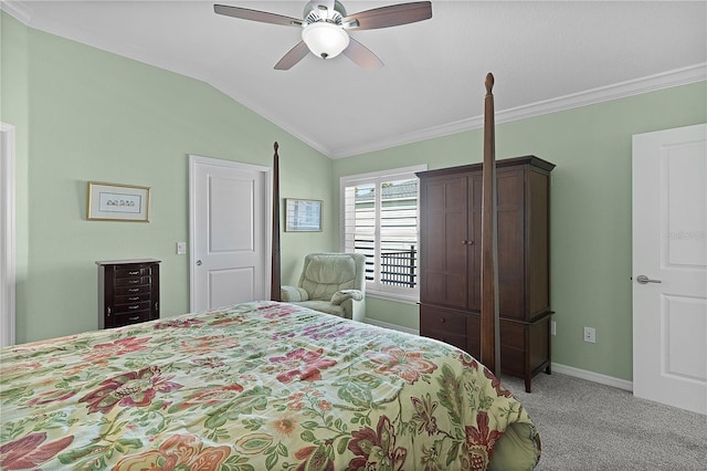 bedroom featuring light carpet, lofted ceiling, crown molding, baseboards, and ceiling fan