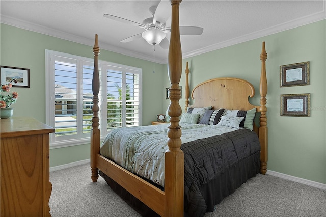 bedroom with baseboards, carpet floors, and ornamental molding