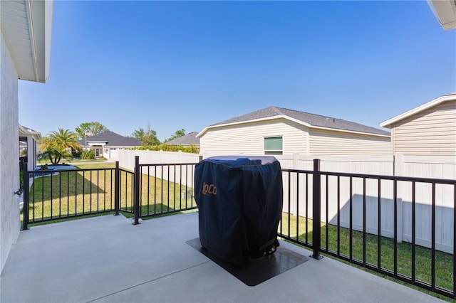 view of patio / terrace featuring a grill and a fenced backyard