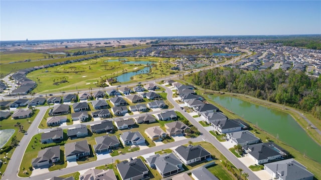 aerial view with a residential view and a water view