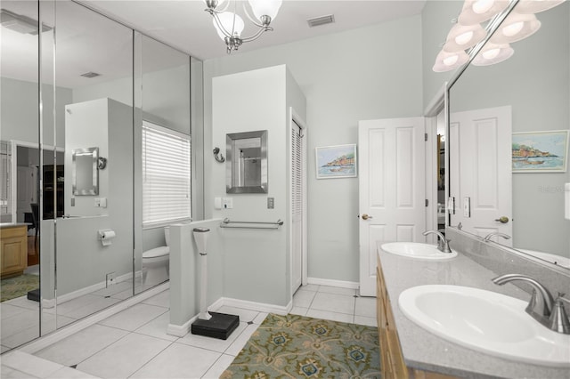 full bath with visible vents, a chandelier, a sink, tile patterned floors, and double vanity