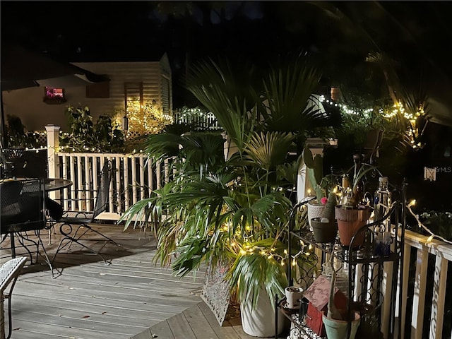 view of deck at twilight