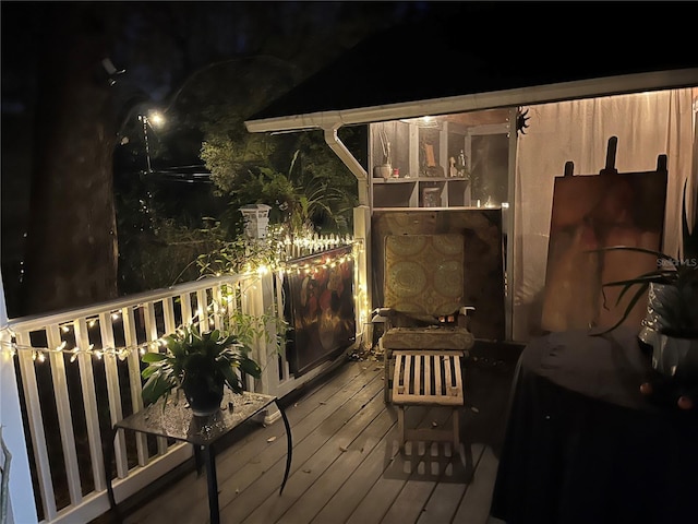 view of deck at night