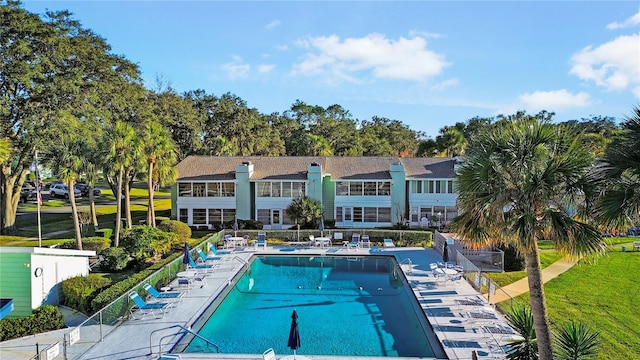 community pool with a patio area