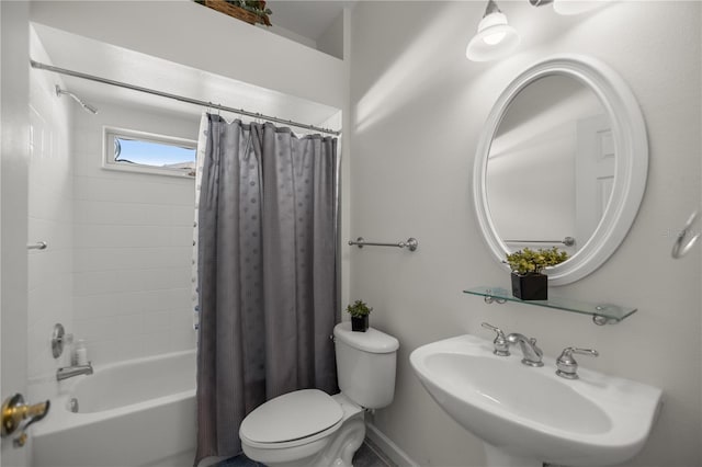 full bathroom featuring a sink, shower / bathtub combination with curtain, and toilet