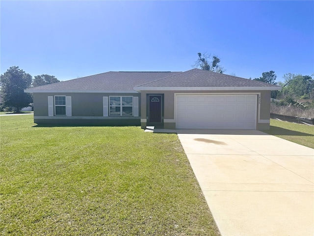 ranch-style house featuring a front yard, concrete driveway, a garage, and stucco siding