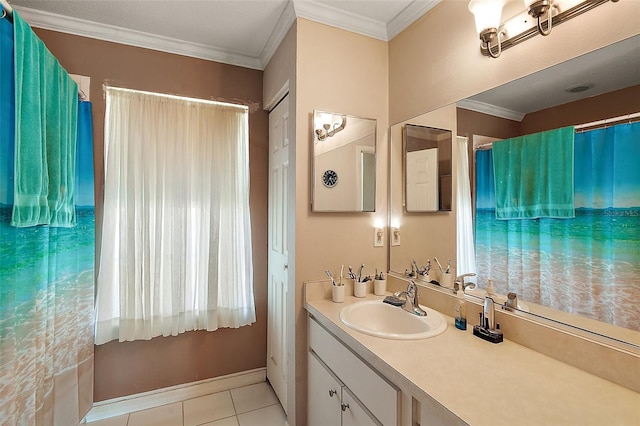 full bath featuring tile patterned floors, vanity, crown molding, and baseboards