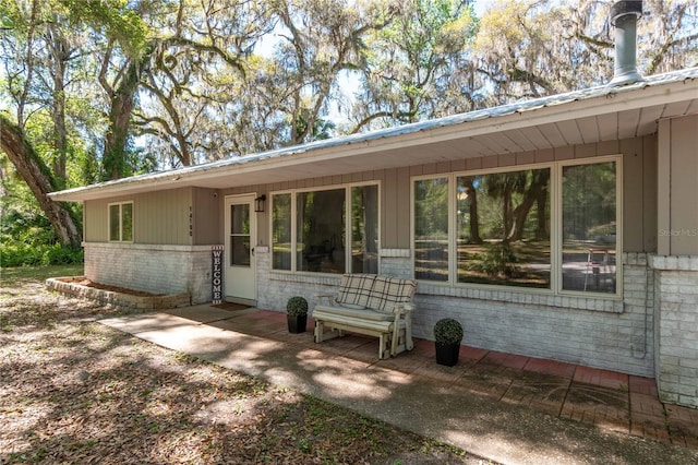 view of front of house with brick siding