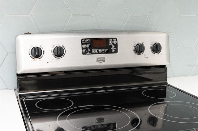 details featuring stainless steel electric stove