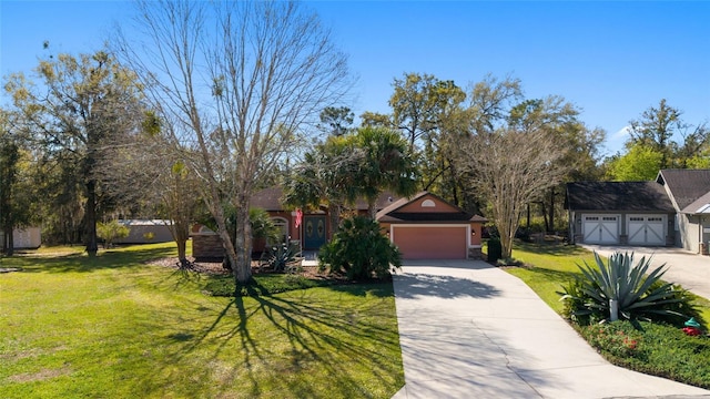 ranch-style home with driveway, an attached garage, and a front yard