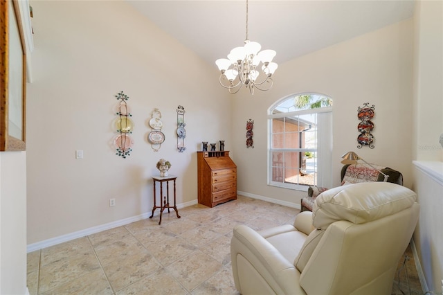 sitting room with light tile patterned floors, baseboards, and a chandelier