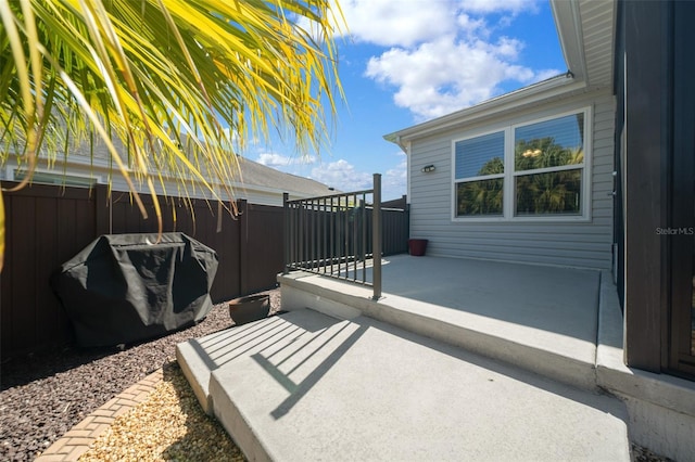 view of patio with fence