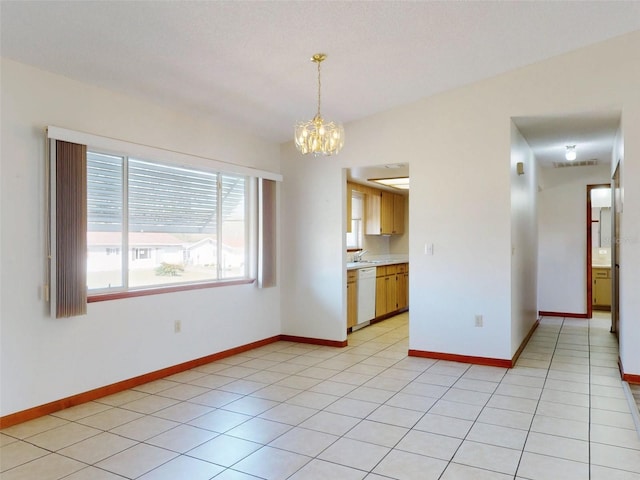 11197 SW 79th Ave, Ocala, FL 34476 - unfurnished room with a chandelier, a sink, and baseboards