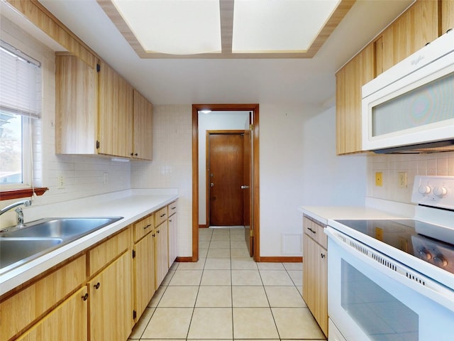 11197 SW 79th Ave, Ocala, FL 34476 - kitchen featuring white appliances, a sink, light countertops, and backsplash