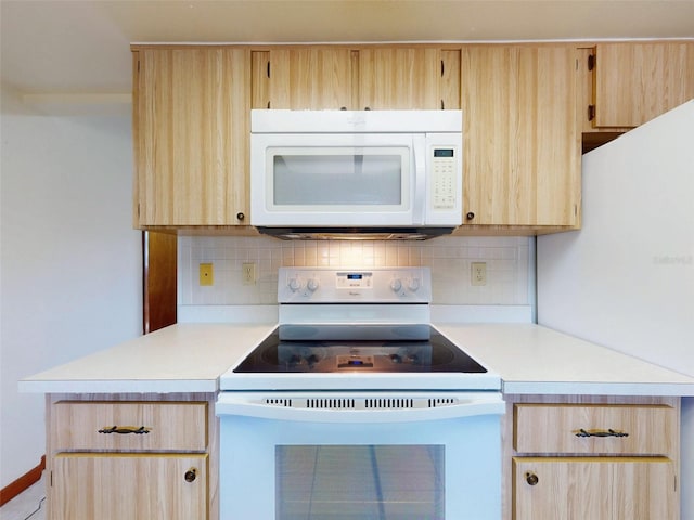11197 SW 79th Ave, Ocala, FL 34476 - kitchen featuring white appliances, light brown cabinetry, light countertops, and decorative backsplash