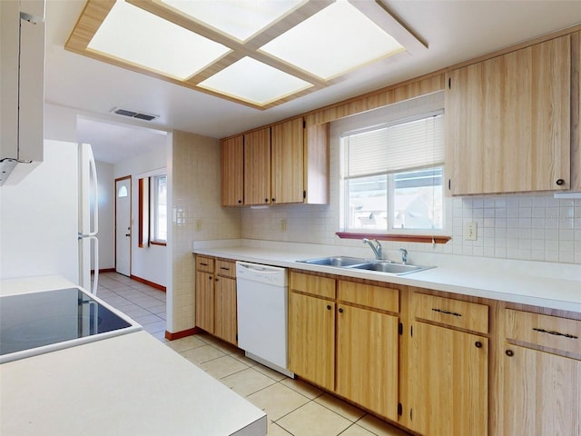 11197 SW 79th Ave, Ocala, FL 34476 - kitchen featuring white appliances, light tile patterned flooring, light countertops, and a sink