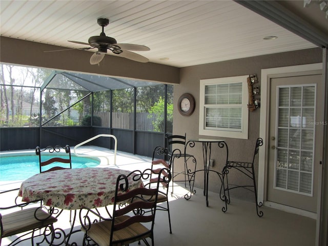 exterior space with ceiling fan, a fenced in pool, a patio, and a lanai