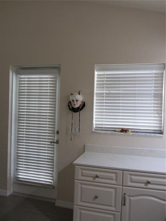 bathroom with baseboards