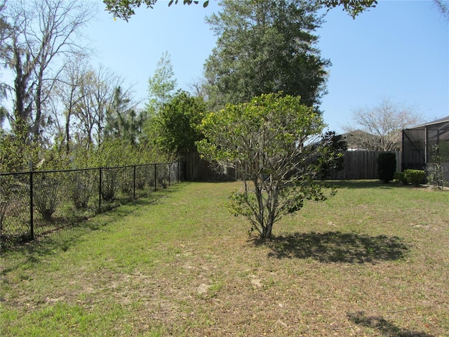 view of yard with a fenced backyard