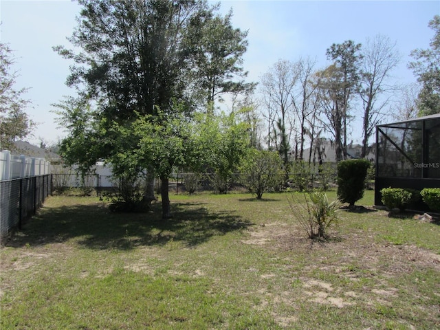 view of yard with fence