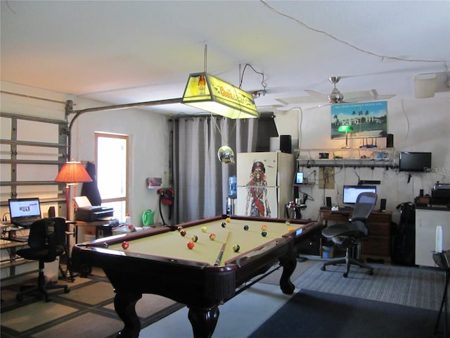 game room with pool table and a ceiling fan