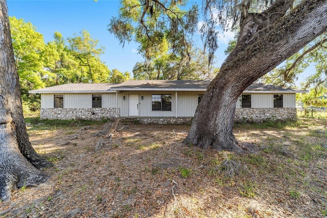 9951 NE 30th Ct, Anthony, FL 32617 - view of front facade featuring stone siding