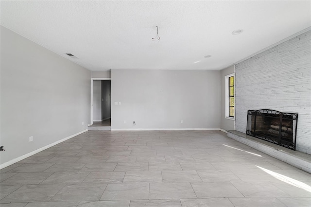9951 NE 30th Ct, Anthony, FL 32617 - unfurnished living room with baseboards, a large fireplace, and visible vents