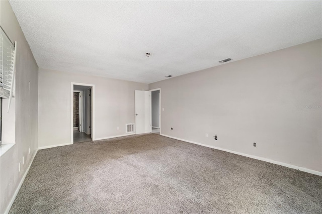 9951 NE 30th Ct, Anthony, FL 32617 - carpeted spare room with a textured ceiling, baseboards, and visible vents