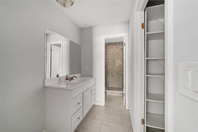 9951 NE 30th Ct, Anthony, FL 32617 - bathroom featuring vanity and a textured ceiling