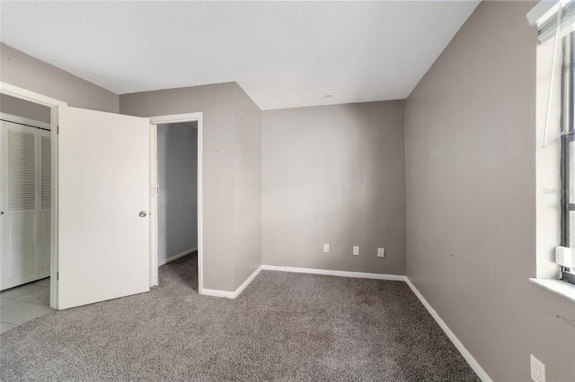 9951 NE 30th Ct, Anthony, FL 32617 - unfurnished bedroom featuring light colored carpet and baseboards