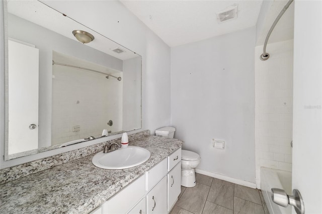 9951 NE 30th Ct, Anthony, FL 32617 - full bathroom with tub / shower combination, visible vents, baseboards, toilet, and vanity
