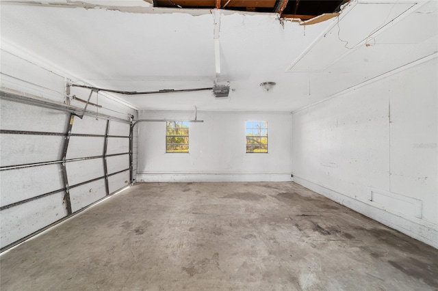 9951 NE 30th Ct, Anthony, FL 32617 - garage featuring a garage door opener