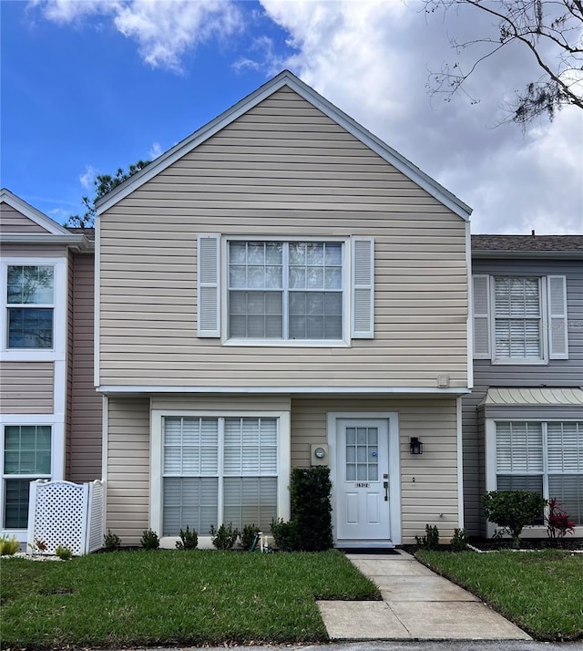 view of front facade with a front lawn