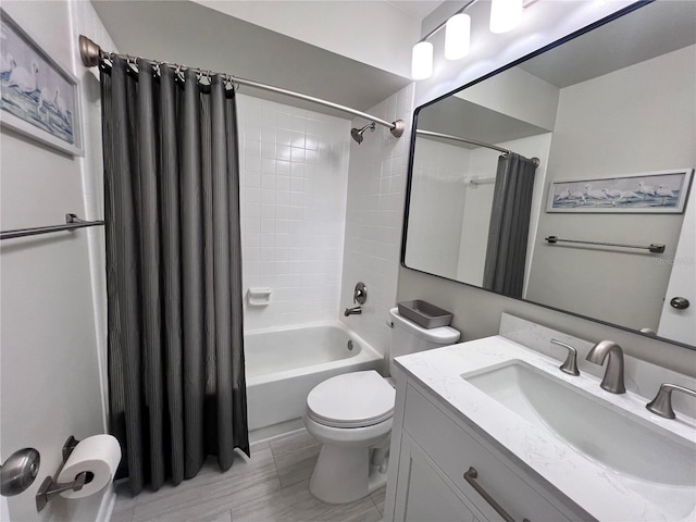 full bathroom with toilet, vanity, and shower / bath combination with curtain