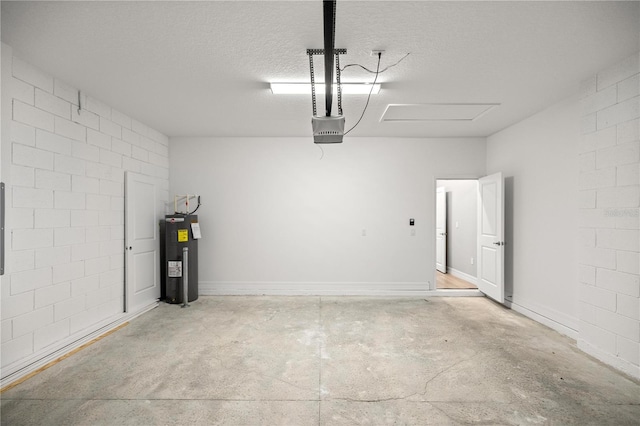 garage with electric panel, a garage door opener, electric water heater, and concrete block wall