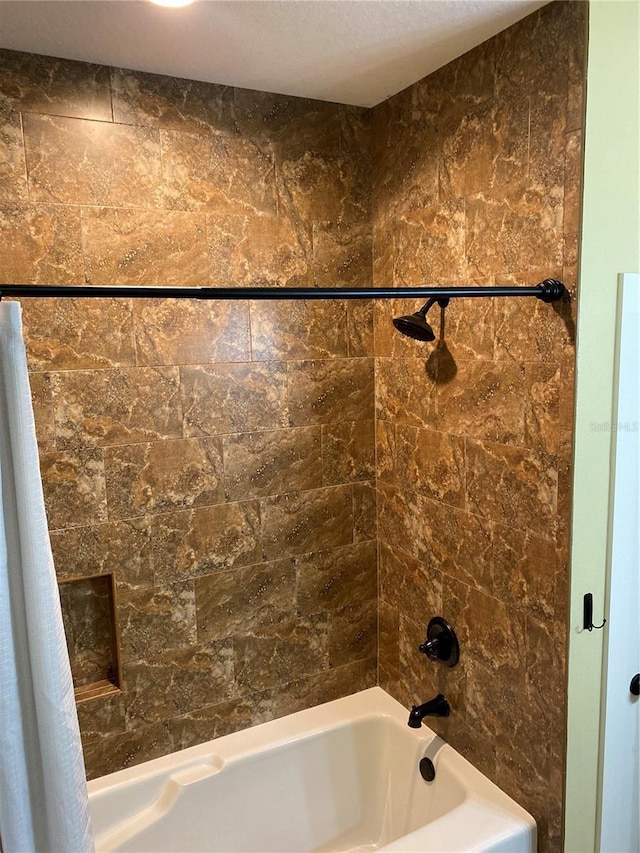 bathroom featuring shower / bath combo