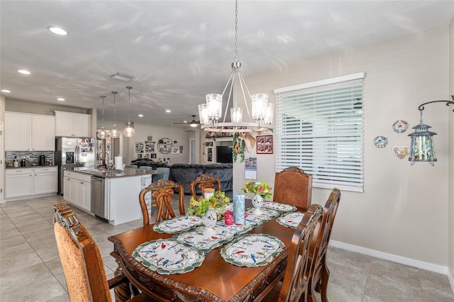 dining room with visible vents, recessed lighting, an inviting chandelier, light tile patterned floors, and baseboards