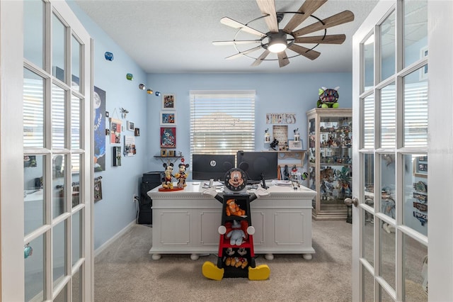 home office with light carpet, plenty of natural light, and french doors