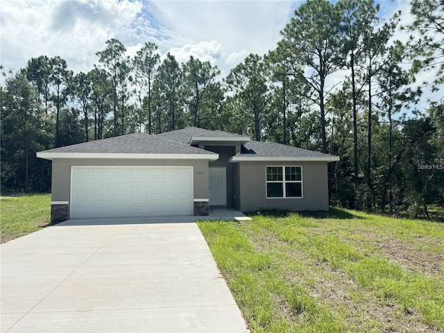 view of front of house featuring a garage, stone siding, driveway, and stucco siding