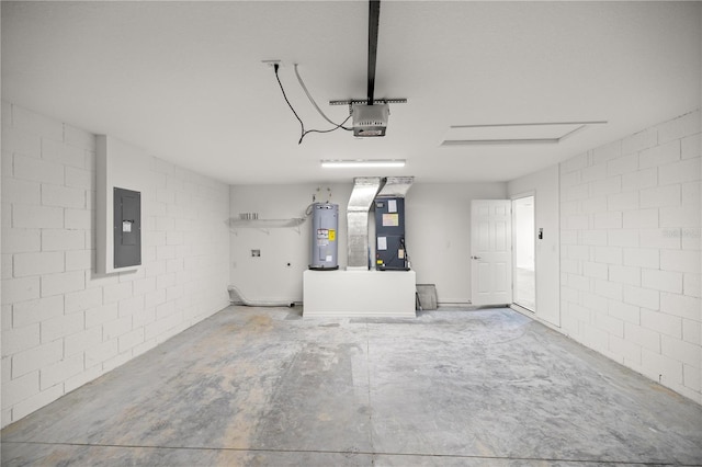 garage with electric water heater, electric panel, a garage door opener, heating unit, and concrete block wall