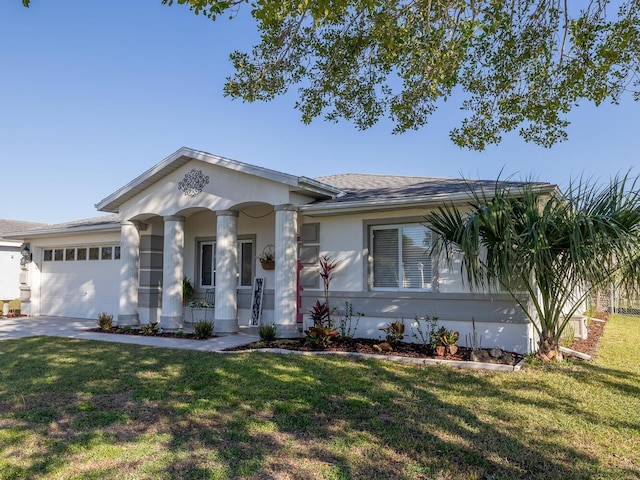 view of front of home with a garage, covered porch, a front yard, and stucco siding